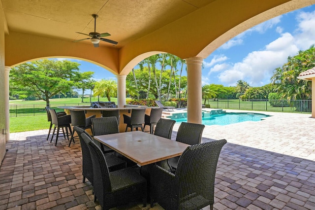 8380 Woodsmuir Dr, West Palm Beach, FL 33412 - view of patio featuring a ceiling fan and a pool with connected hot tub