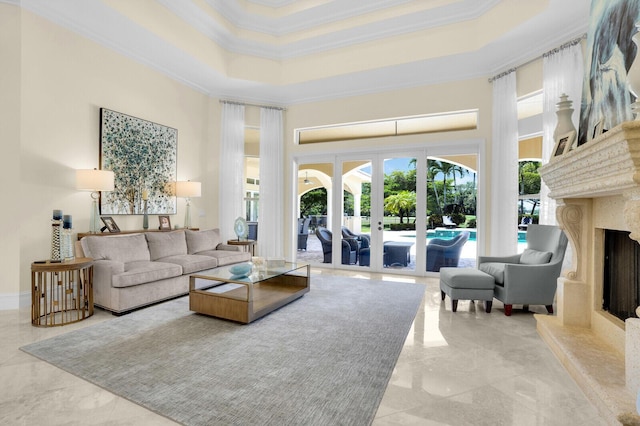 8380 Woodsmuir Dr, West Palm Beach, FL 33412 - living area featuring a towering ceiling, crown molding, marble tiled floors, a high end fireplace, and french doors