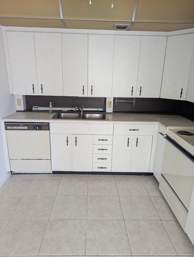 3022 Ainslie B 3022, Boca Raton, FL 33434 - kitchen featuring white appliances, a sink, light tile patterned floors, and light countertops