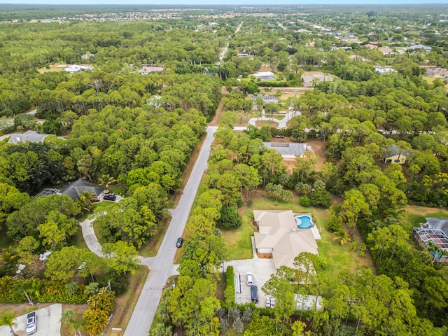 drone / aerial view of a heavily wooded area