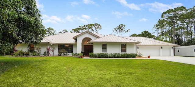 15864 78th Dr N, Palm Beach Gardens, FL 33418 - single story home with stucco siding, a standing seam roof, a front yard, an attached garage, and metal roof