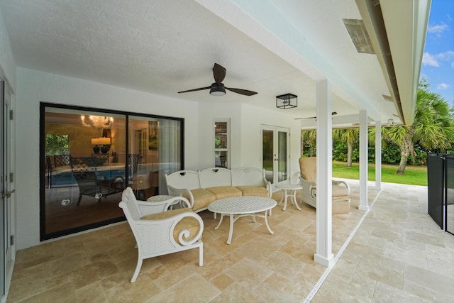 view of patio featuring french doors and ceiling fan