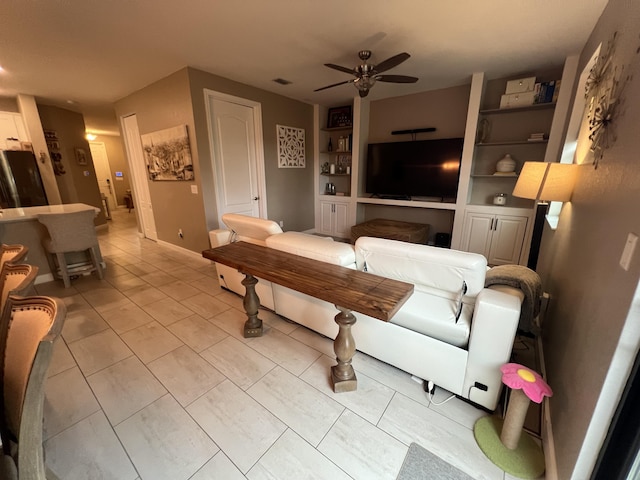 13044 Anthorne Ln, Boynton Beach, FL 33436 - living area featuring ceiling fan and baseboards