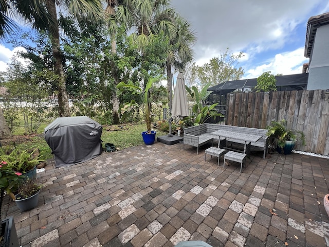 13044 Anthorne Ln, Boynton Beach, FL 33436 - view of patio with grilling area and outdoor dining space