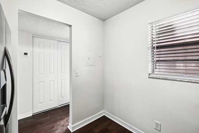 12012 Greenway Cir S Unit 206, Royal Palm Beach, FL 33411 - washroom with a textured ceiling, dark wood-style flooring, and baseboards