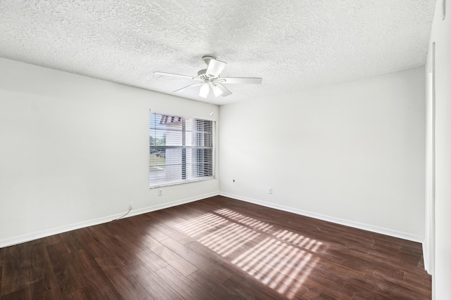 12012 Greenway Cir S Unit 206, Royal Palm Beach, FL 33411 - unfurnished room featuring ceiling fan, dark wood-style flooring, baseboards, and a textured ceiling