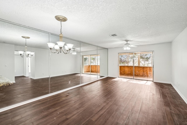 12012 Greenway Cir S Unit 206, Royal Palm Beach, FL 33411 - unfurnished living room with a textured ceiling, a chandelier, wood finished floors, ceiling fan, and baseboards