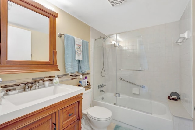 full bathroom with bathtub / shower combination, toilet, and vanity