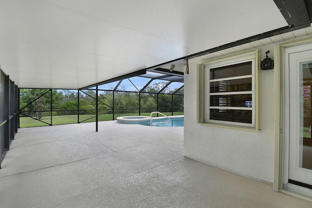 895 SE Waterside Way, Stuart, FL 34997 - view of swimming pool featuring a patio, a pool with connected hot tub, and a lanai