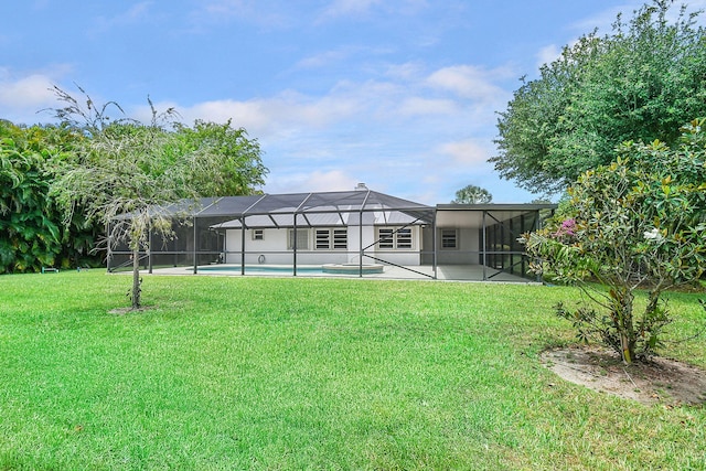 895 SE Waterside Way, Stuart, FL 34997 - back of property featuring a lawn, an outdoor pool, a patio, and a lanai