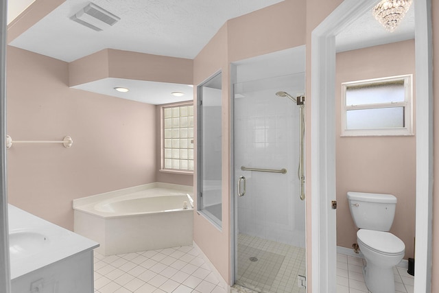 895 SE Waterside Way, Stuart, FL 34997 - bathroom featuring tile patterned flooring, a stall shower, toilet, and a garden tub