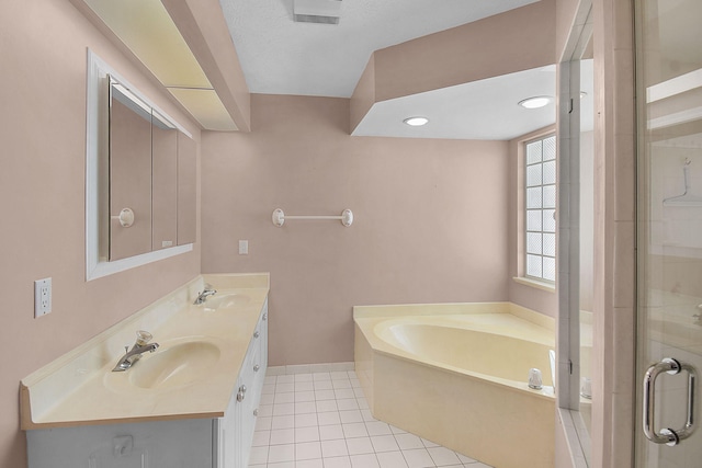 895 SE Waterside Way, Stuart, FL 34997 - full bathroom featuring tile patterned floors, a bath, a stall shower, double vanity, and baseboards