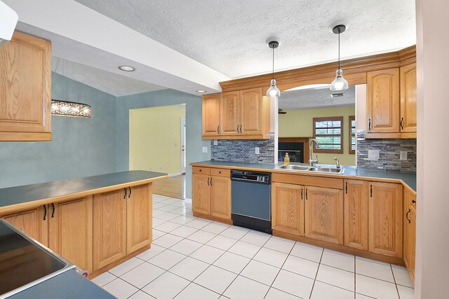 895 SE Waterside Way, Stuart, FL 34997 - kitchen with dishwasher, a sink, backsplash, hanging light fixtures, and light tile patterned floors