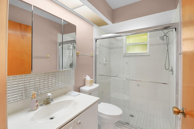 895 SE Waterside Way, Stuart, FL 34997 - full bath with a stall shower, toilet, decorative backsplash, and vanity