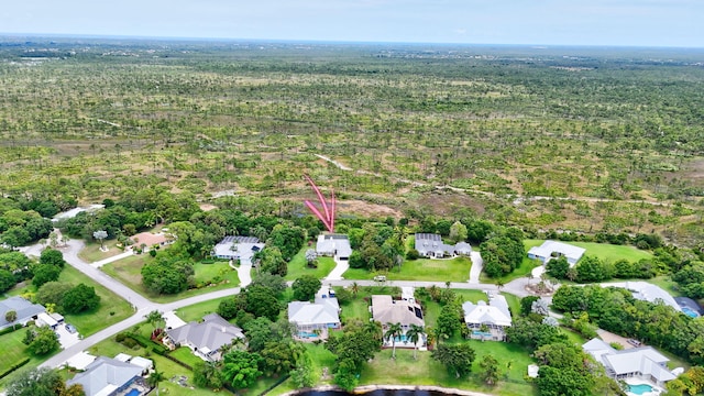 895 SE Waterside Way, Stuart, FL 34997 - aerial overview of property's location featuring nearby suburban area and a forest