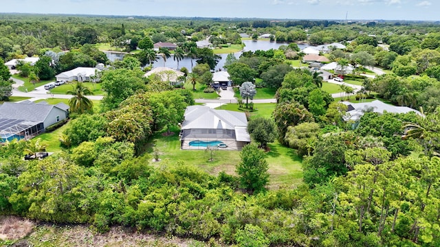 895 SE Waterside Way, Stuart, FL 34997 - aerial perspective of suburban area featuring a large body of water and a pool area