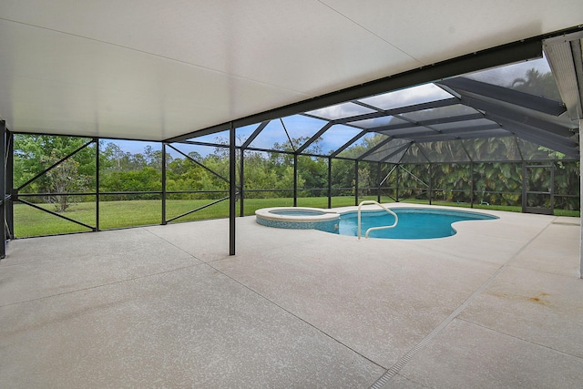 895 SE Waterside Way, Stuart, FL 34997 - view of swimming pool featuring a patio area, a pool with connected hot tub, and a lanai