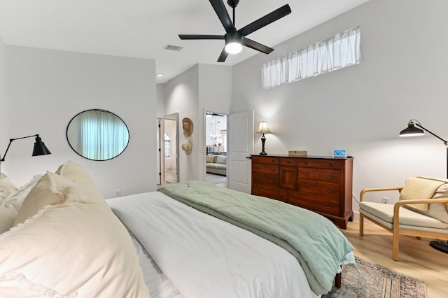 bedroom with wood finished floors, ceiling fan, and recessed lighting