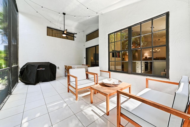 view of patio / terrace featuring a ceiling fan and area for grilling