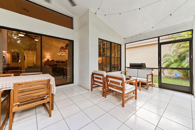 sunroom / solarium with vaulted ceiling and plenty of natural light
