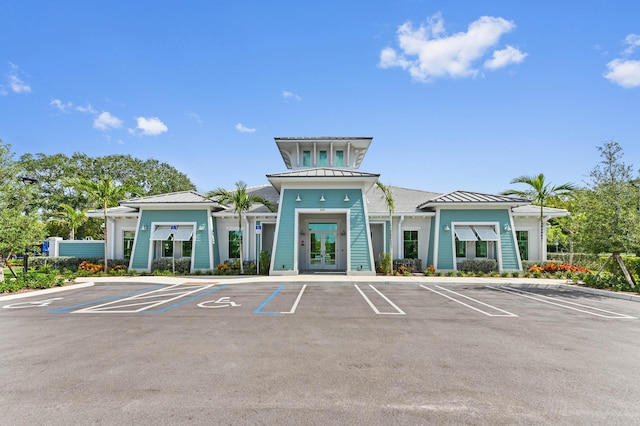 view of property with uncovered parking