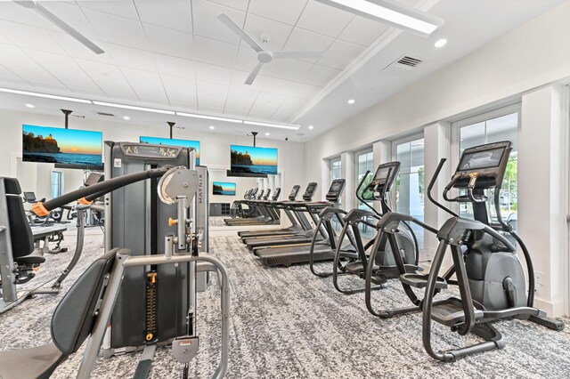 workout area featuring carpet floors and recessed lighting