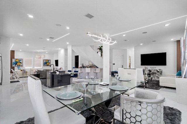 682 Cresta Cir, West Palm Beach, FL 33413 - dining area with a chandelier and recessed lighting