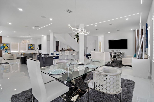 682 Cresta Cir, West Palm Beach, FL 33413 - dining space with a chandelier and recessed lighting