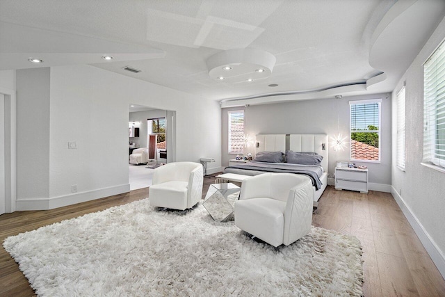 682 Cresta Cir, West Palm Beach, FL 33413 - bedroom featuring wood finished floors, recessed lighting, and baseboards