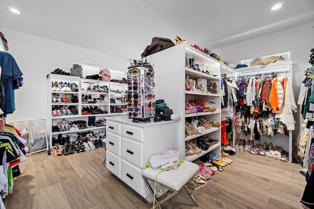 682 Cresta Cir, West Palm Beach, FL 33413 - walk in closet with wood finished floors