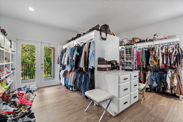 682 Cresta Cir, West Palm Beach, FL 33413 - spacious closet with wood finished floors and french doors