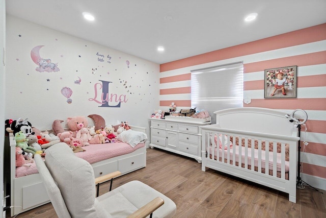 682 Cresta Cir, West Palm Beach, FL 33413 - bedroom with light wood-type flooring and recessed lighting