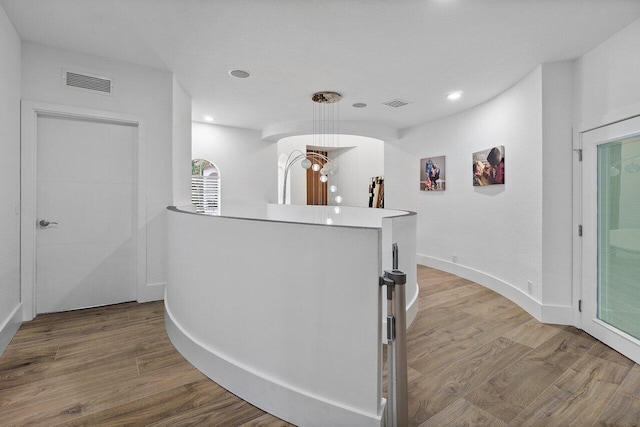 682 Cresta Cir, West Palm Beach, FL 33413 - hall with wood finished floors and recessed lighting