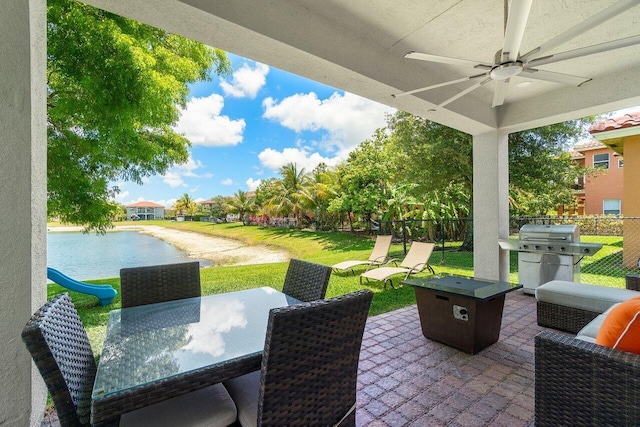 682 Cresta Cir, West Palm Beach, FL 33413 - view of patio with a grill, ceiling fan, outdoor dining area, and an outdoor fire pit