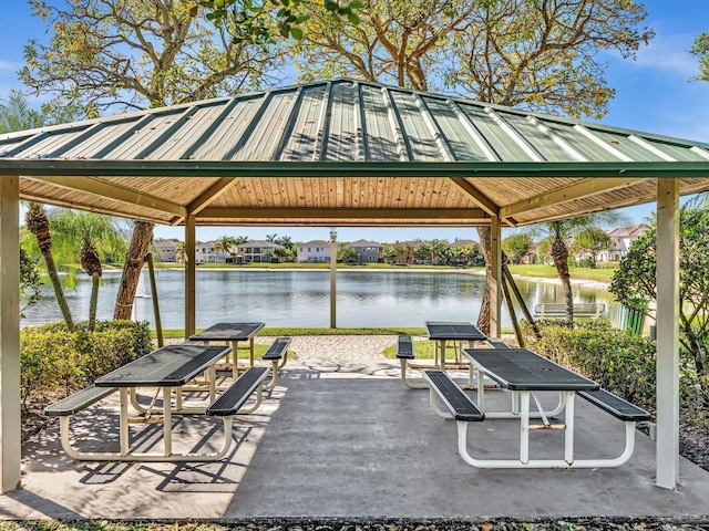 682 Cresta Cir, West Palm Beach, FL 33413 - view of patio / terrace with a gazebo and a water view