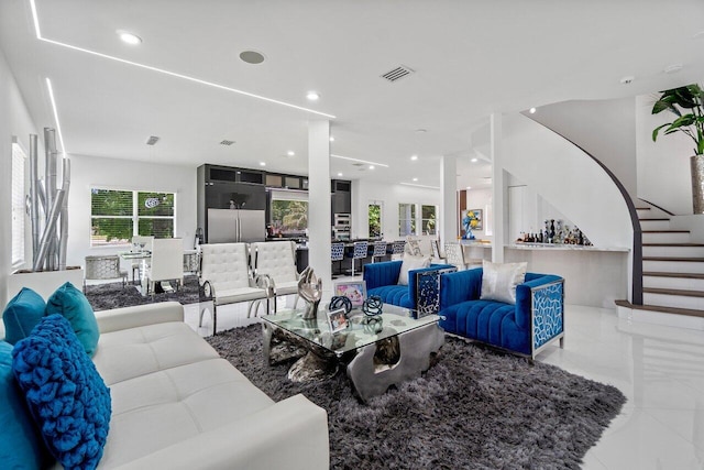 682 Cresta Cir, West Palm Beach, FL 33413 - living area featuring healthy amount of natural light and recessed lighting
