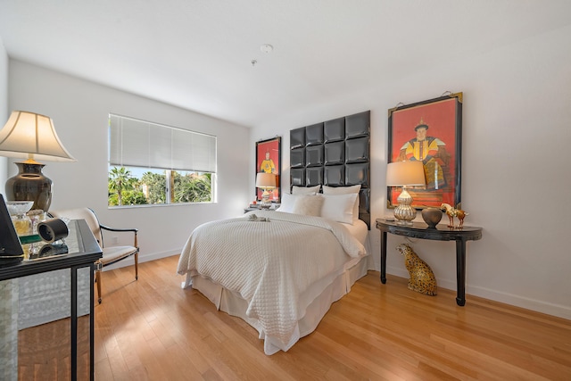 11011 Legacy Ln Unit 306, Palm Beach Gardens, FL 33410 - bedroom featuring baseboards and wood finished floors