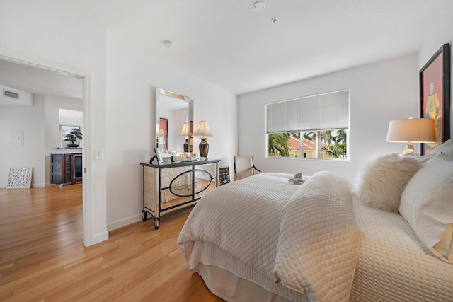 11011 Legacy Ln Unit 306, Palm Beach Gardens, FL 33410 - bedroom with light wood-style floors and baseboards