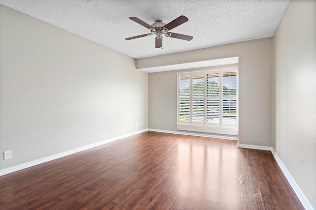 22924 Ironwedge Dr, Boca Raton, FL 33433 - empty room with wood finished floors, a ceiling fan, a textured ceiling, and baseboards