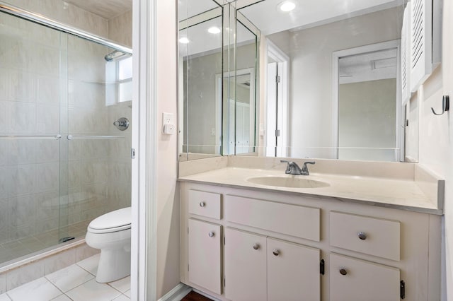 22924 Ironwedge Dr, Boca Raton, FL 33433 - bathroom featuring toilet, a shower stall, vanity, and tile patterned floors