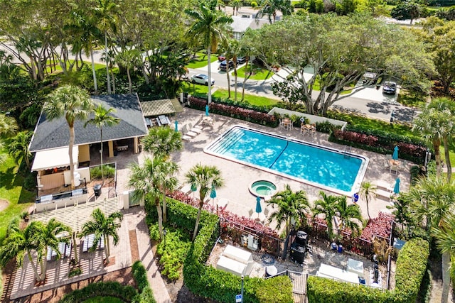 community pool featuring a patio area