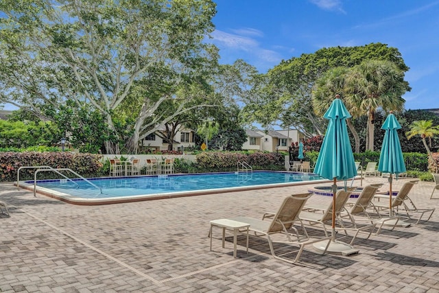 community pool featuring a patio