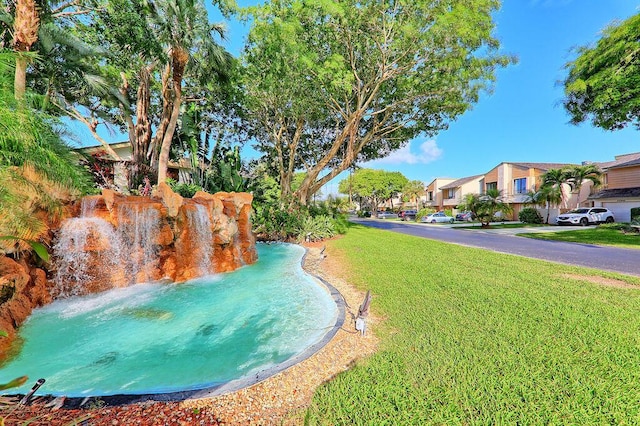 22924 Ironwedge Dr, Boca Raton, FL 33433 - view of pool with a lawn and a residential view