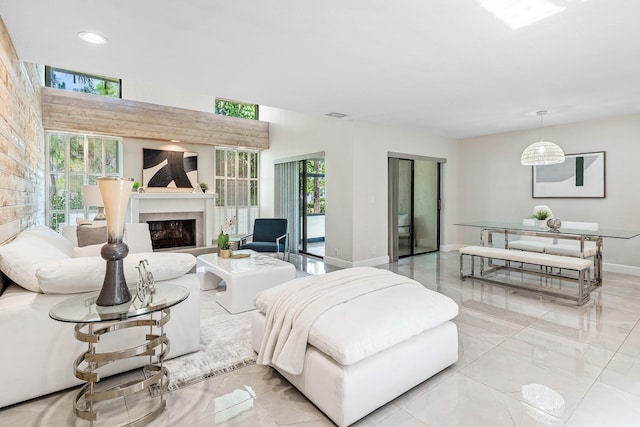 22924 Ironwedge Dr, Boca Raton, FL 33433 - living room featuring baseboards, plenty of natural light, a fireplace, recessed lighting, and marble finish flooring