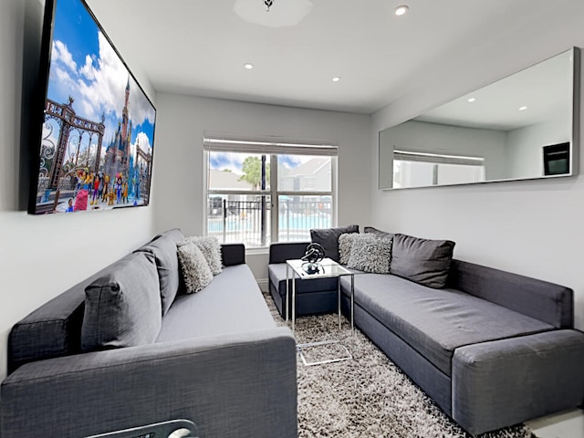 3100 Parkway Blvd Unit 310, Kissimmee, FL 34747 - living room with recessed lighting and baseboards