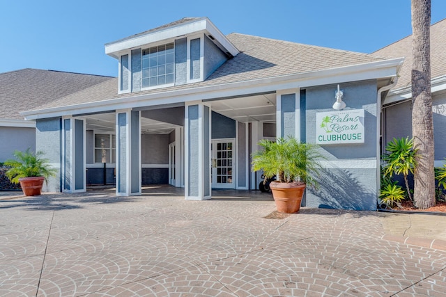 3100 Parkway Blvd Unit 310, Kissimmee, FL 34747 - property entrance with a shingled roof
