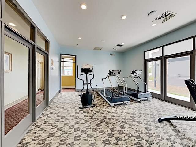3100 Parkway Blvd Unit 310, Kissimmee, FL 34747 - workout room featuring baseboards and recessed lighting