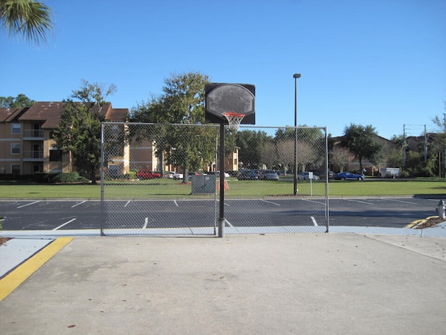 3100 Parkway Blvd Unit 310, Kissimmee, FL 34747 - view of basketball court with community basketball court and fence
