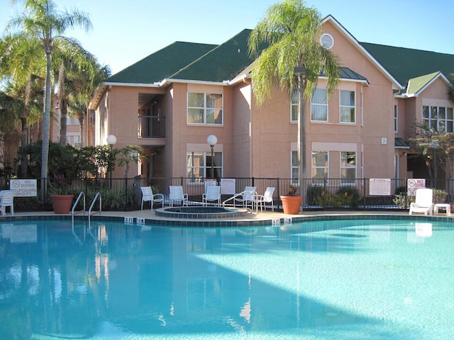 3100 Parkway Blvd Unit 310, Kissimmee, FL 34747 - community pool featuring fence