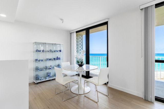 3360 S Ocean Blvd Unit 5Fii, Palm Beach, FL 33480 - dining area featuring light wood finished floors, baseboards, and recessed lighting